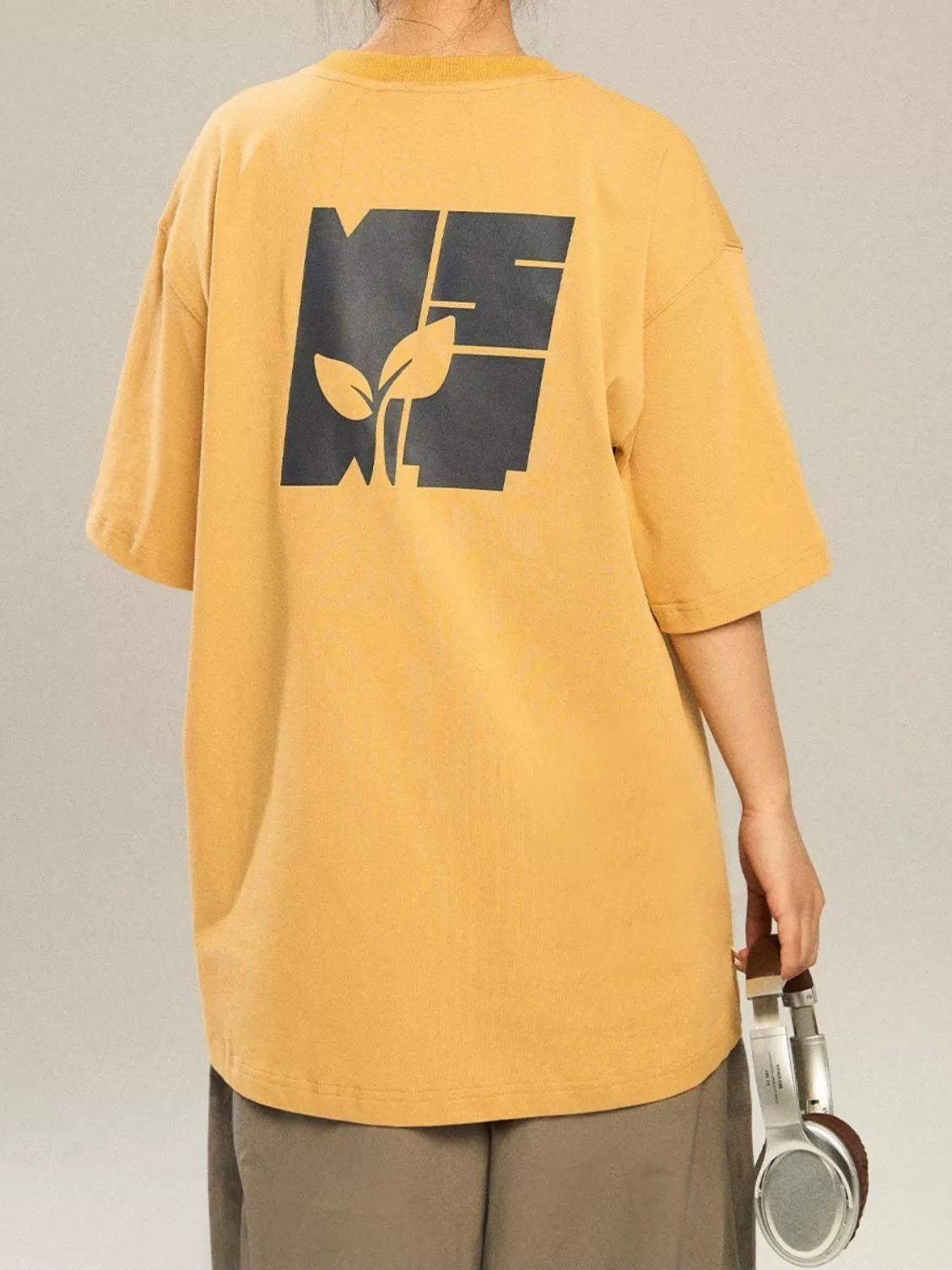 Casual T-Shirt with Growing Plant Design - chiclara